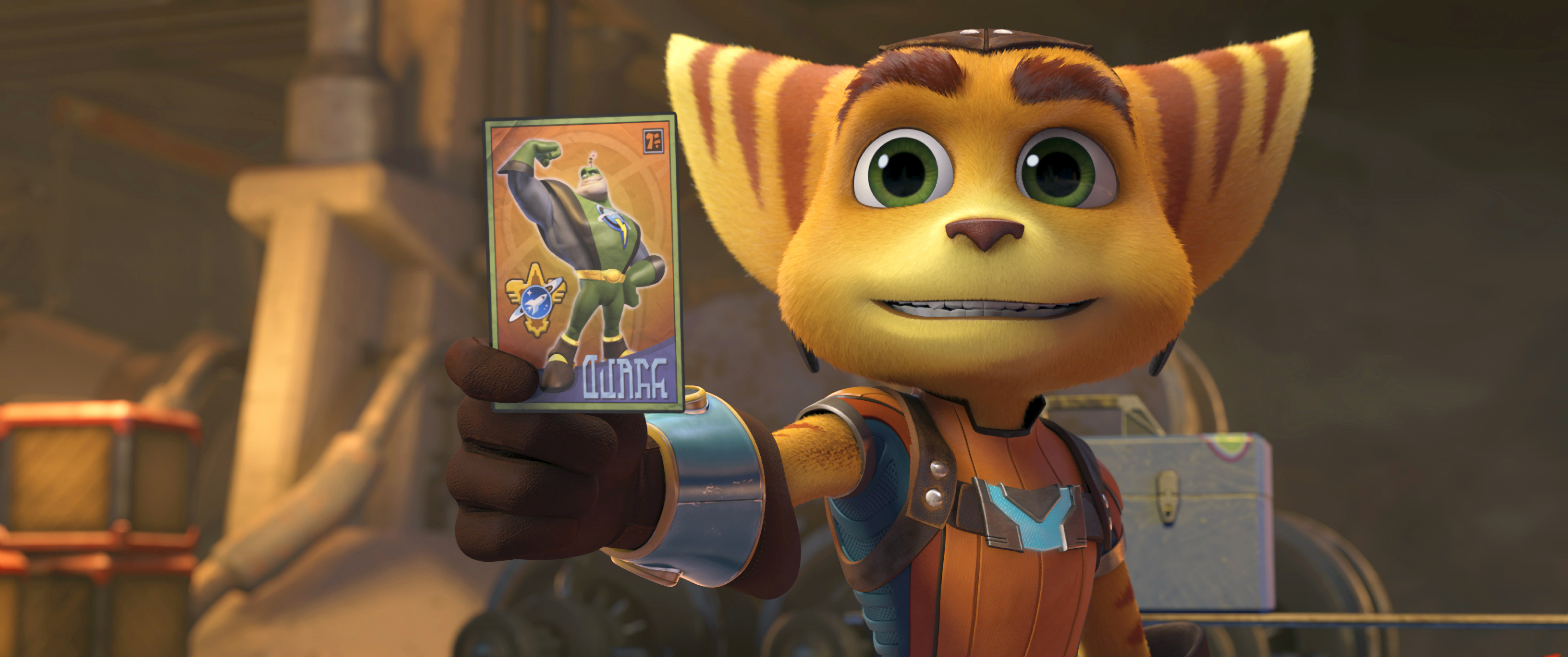 Ratchet_holds_up_his_QWARK_TRADING_CARD-Highres_copy.png